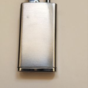 Nacon Perfume Atomizer silver and gold in color